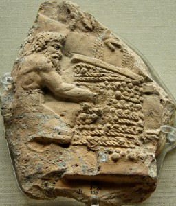 First century C.E. relief of a satyr working with grapes and wicker mats