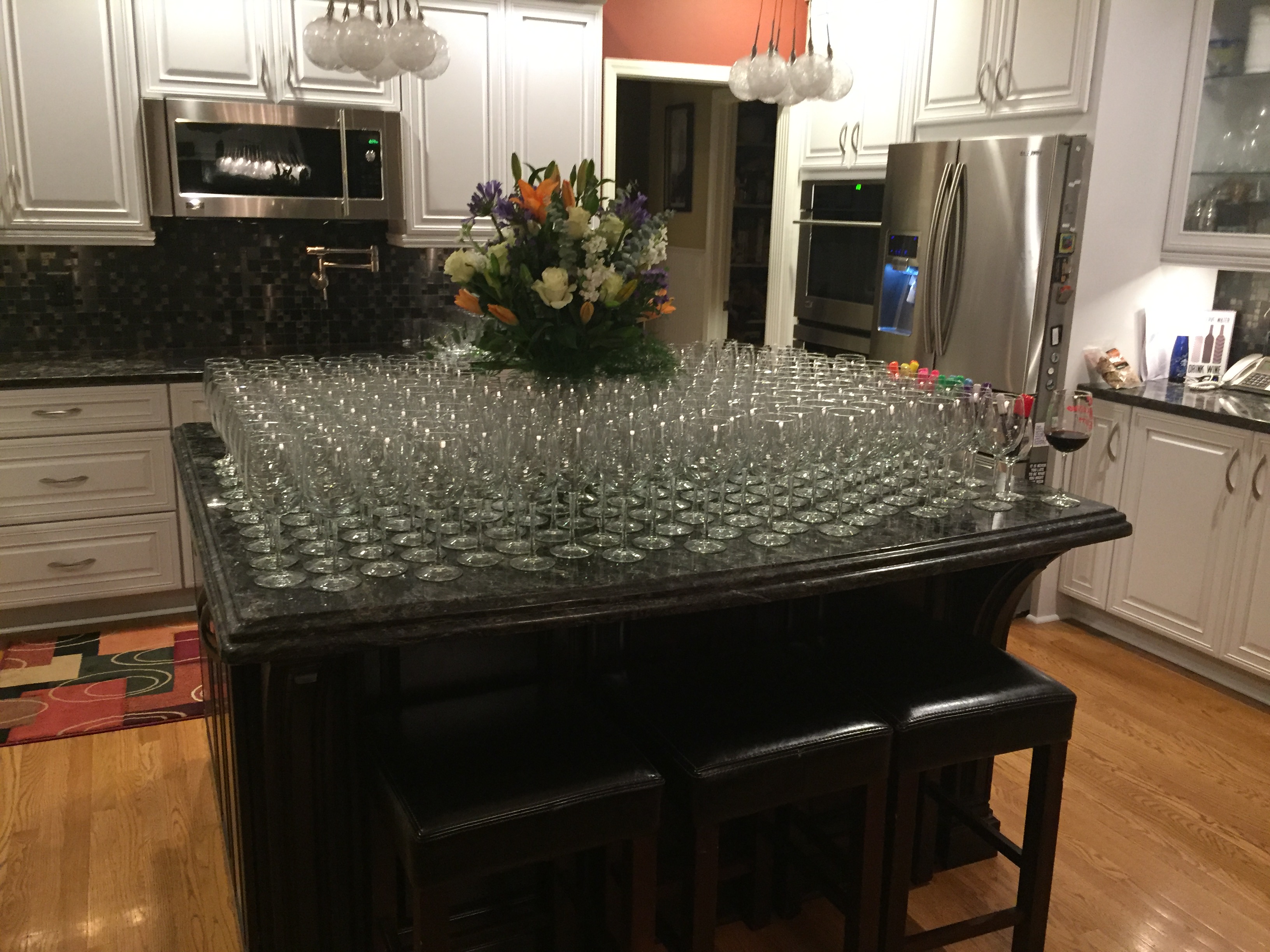150 wine glasses, waiting for guests to arrive